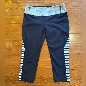 Athleta navy blue leggings with striped details size Large